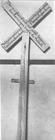 SA0721b - Photo showing Shaker cross posted outside buildings at the height of a religious revival in 1843. Identified on the back.